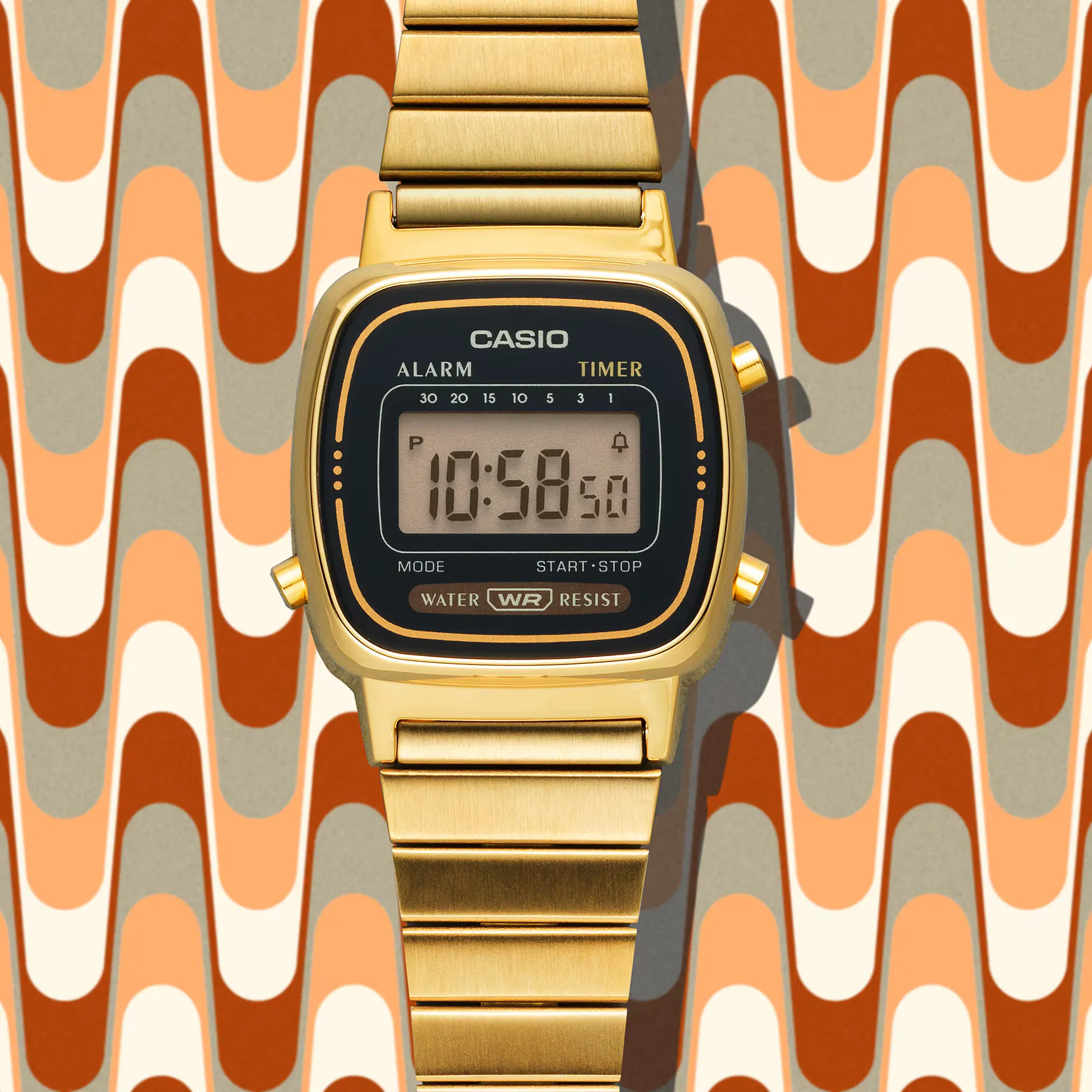 Casio LA670WGA-1 with gold-tone bracelet and black digital face