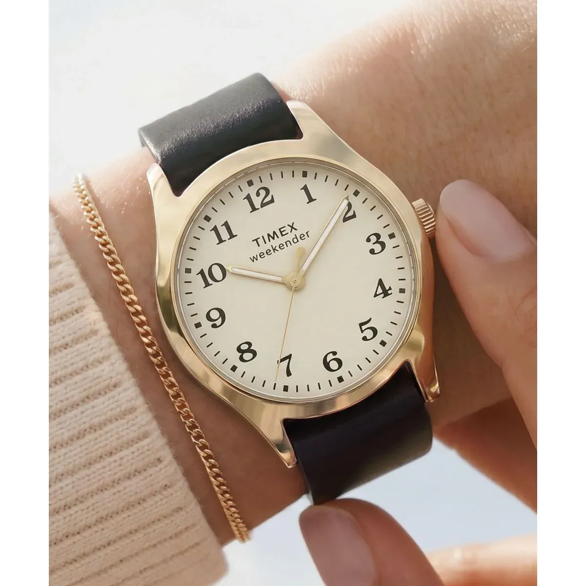 Timex TW2Y86600UJ with cream dial, gold-tone case and black leather strap