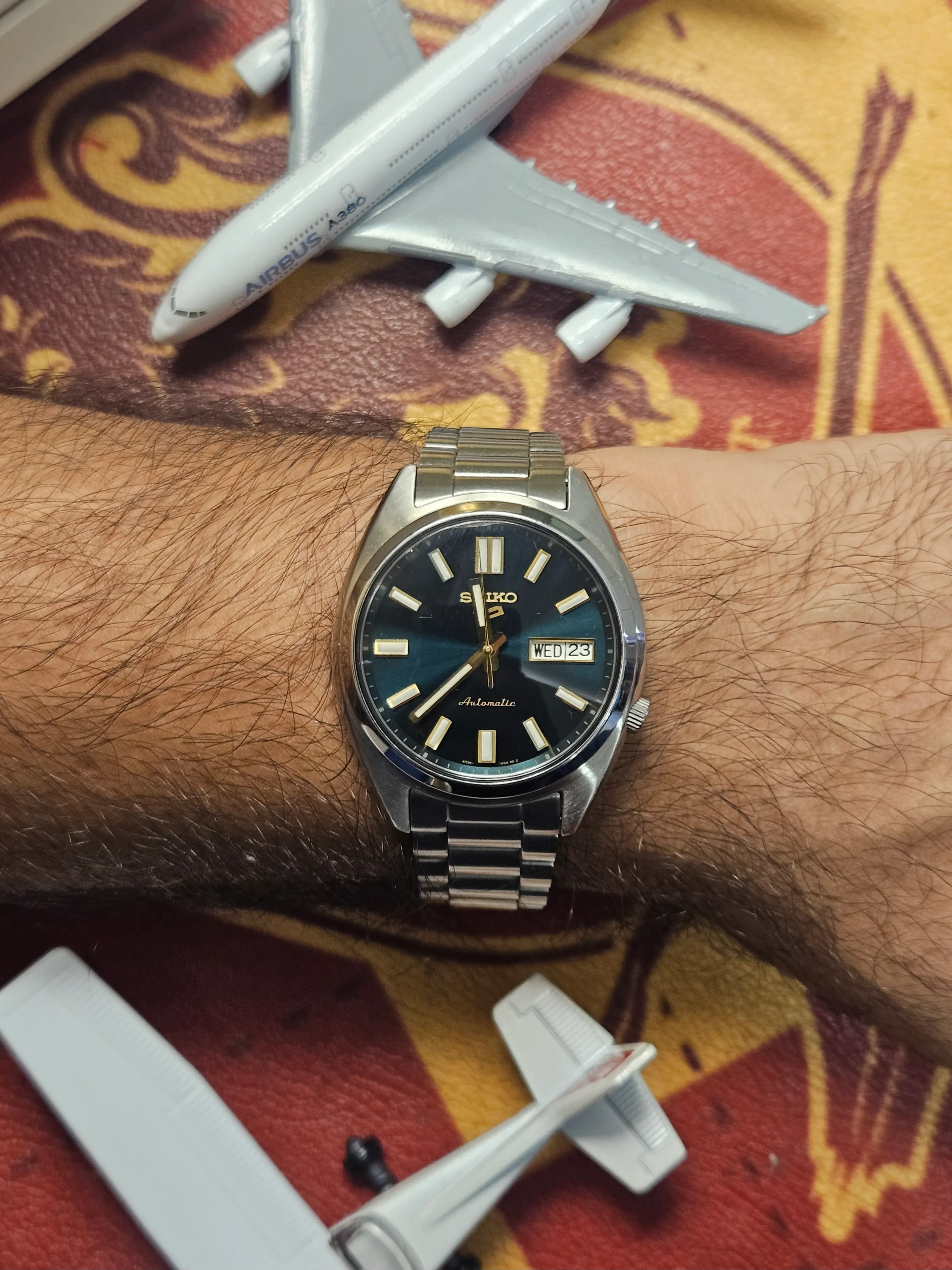 Seiko SRPL57K1 worn on the wrist, showing its compact case shape