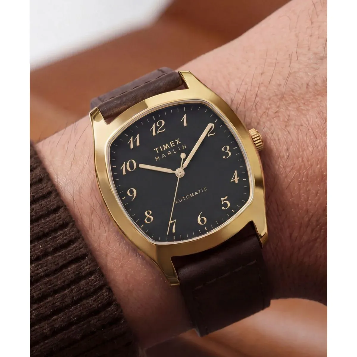 Timex Marlin Tonneau with black dial and gold-tone case
